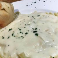 Fettuccini · Fettuccini noodles served with your choice of sauce, a side, and garlic roll