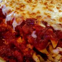 Lasagna · Our homemade lasagna is prepared with marinara and Sam & Louie's signature pizza sauce, laye...