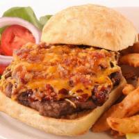 Cowboy Burger · 1/3 pound black Angus burger seasoned with our signature spice, cooked to medium well and ga...