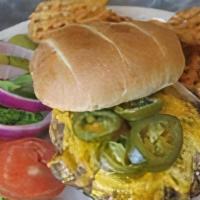 Jalapeno Burger · 1/3 pound black Angus burger seasoned with our signature spice, cooked to medium well and ga...