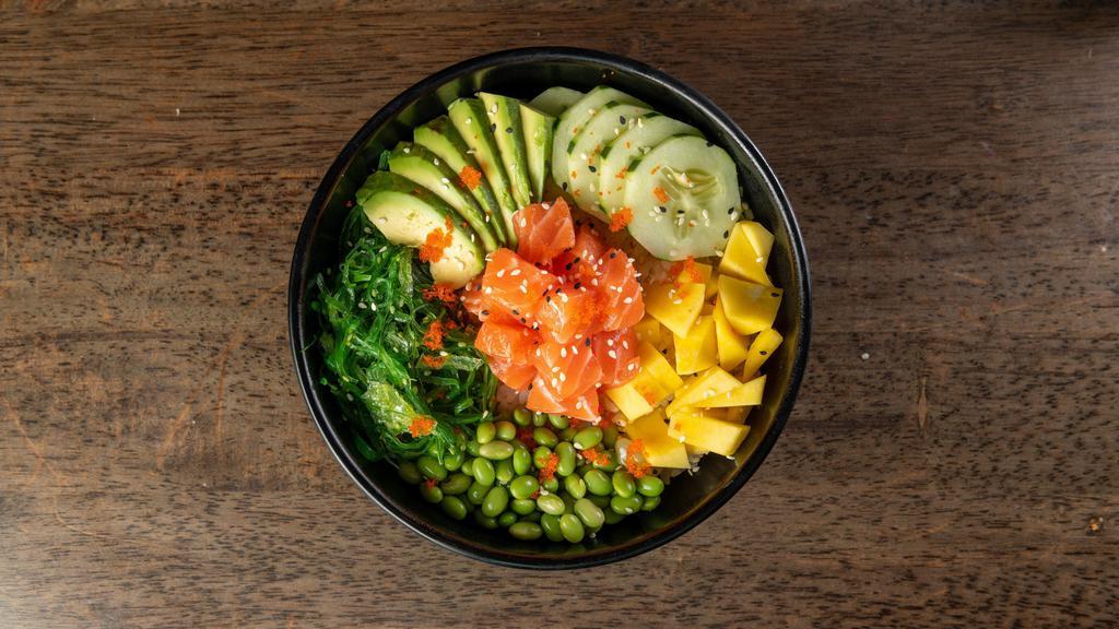 Salmon Poke Bowl · Mixed in: avocado cucumber edamame oshinko caviar seaweed salad and sesame seed and onion. served with choice of base sauce and a side.