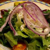 Taverna Greek Salad  · Romaine lettuce tossed with kalamata olives and imported Greek feta cheese, onions, tomatoes...