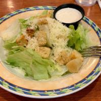 Caesar Salad  · Romaine lettuce, garlic croutons and shaved parmesan cheese.