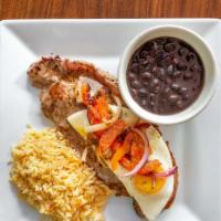 Beef Steak · New York steak marinated with our special chef's sauce. Served with fried plantains.