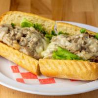 Cheese Steak · Thin sliced beef with provolone cheese, grilled onions, lettuce, tomato and mayo.