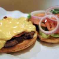S&C Burger · Seven ounce angus beef patty topped with bacon, American cheese, lettuce, tomato, onions, an...