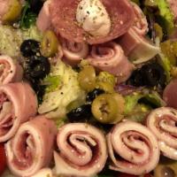 Antipasto Salad (Large) · Mixed greens topped with rolled ham Genoa salami, provolone, fresh mozzarella, mixed olives,...