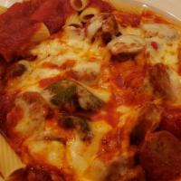 Sausage & Peppers Parmigiana · With penne pasta.