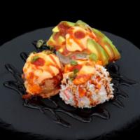 Mini Ahi Tower · crab, spicy tuna, avocado, masago, scallion, spicy mayo, eel sauce, sriracha