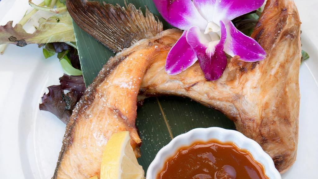 Hamachi Kama · Double-baked tender yellowtail jaw seasoned and smothered in our homemade teriyaki sauce.