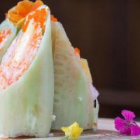 Sushi Spring Roll · Naruto style spring rolls filled with steamed shrimp, crab stick salad, mango, and tempura c...