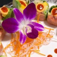 Holiday Maki Spicy Roll · Spicy. Spicy tuna, fresh mango, mixed greens, avocado, and cucumber in a rice paper wrap, to...