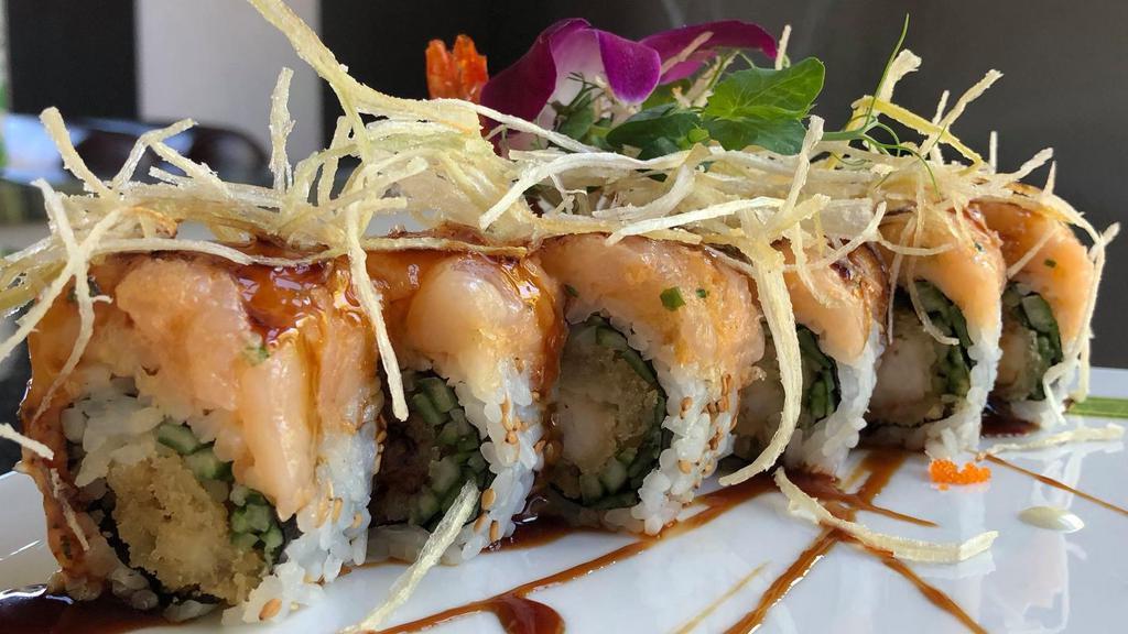 Dragonfly Maki Roll · Shrimp tempura and cucumber topped with spicy raw scallop, sweet potato crunch and kabayaki sauce.