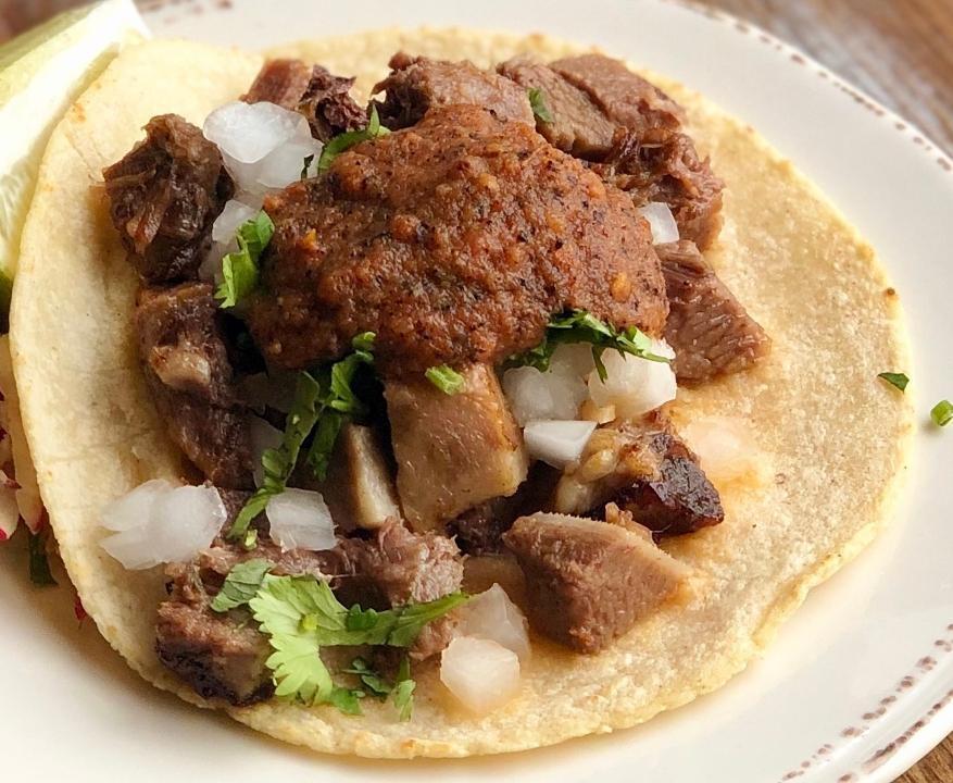 Lengua Tacos. · BRAISED BEEF TONGUE | SALSA ARBOL | ONIONS | CILANTRO