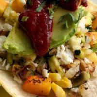 Roasted Vegetable Tacos. · SQUASH | ZUCCHINI | CORN | ONION | QUESO FRESCO | JALAPENO | AVOCADO | GUAJILLO SALSA