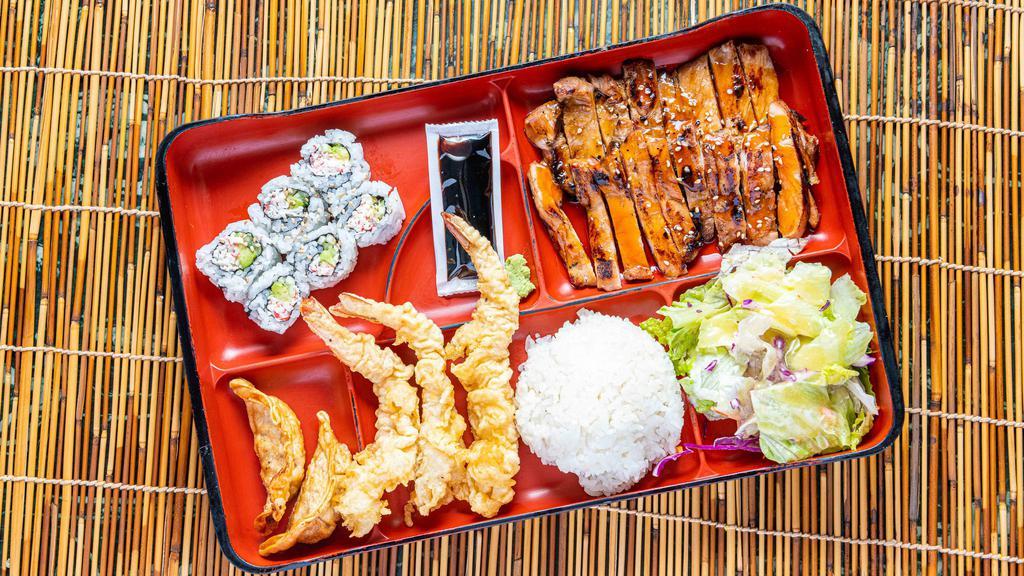 Large Bento · Chicken teriyaki, California roll, shrimp tempura (3 pieces), gyoza (2 pieces), comes with steamed rice and salad.