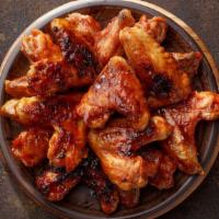 The Bbq Chicken Wings · Fresh batch of wings tossed in chef's BBQ sauce.