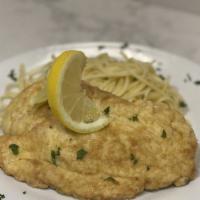 Chicken Francese · Egg battered pan fried chicken breasts topped with a homemade lemon wine butter sauce served...