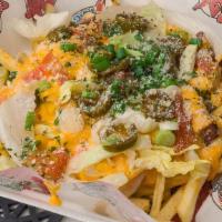 Loaded Fries · Fries, Cheese , Chicken, Shrimp & Sausage, Sour Cream , Green Onions, Jalapeños