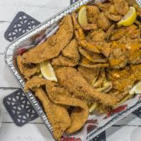 Combo #3 · 6 Fish Strips , 12 Shrimp , 2 Blue Crabs, and Choice of 2 Sides (Family Size Platter)