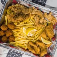 Combo #2 The Sampler · 6 Hush Puppies +  4 Chicken Tender (choice of flavor) + 4 Catfish Nuggets +  2 Sides