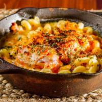 Lobster Mac And Cheese · Lobster meat, cave aged cheddar cheese sauce, buttery bread crumb topping, cavatappi pasta
