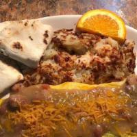 Green Chili · Green chili strips and cheese, smothered in homemade green chili with hashbrowns and tortill...