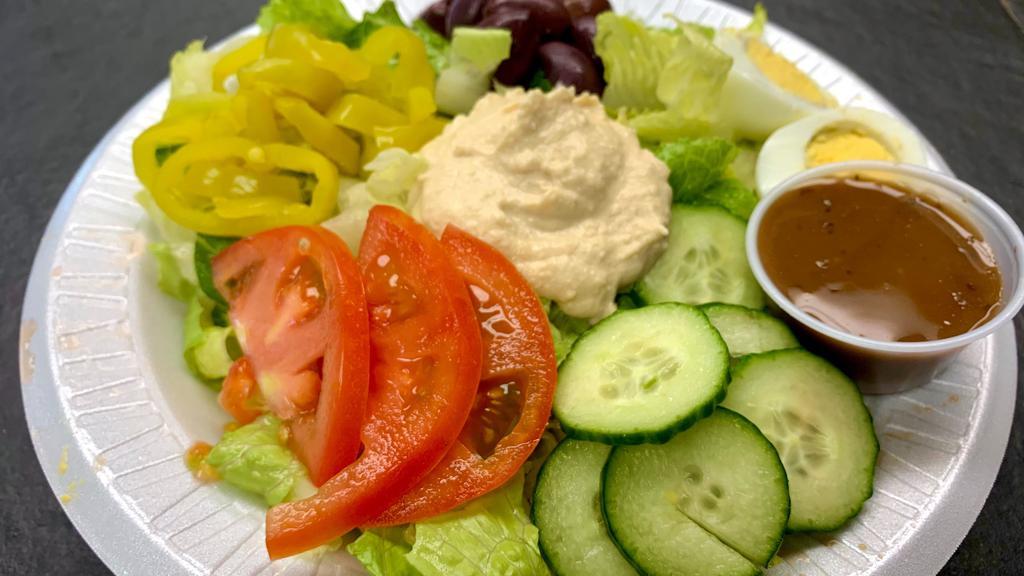 Build Your Own Salad · Start with a base of Lettuce, Tomatoes, and Cucumber. Includes 4 toppings from the salad bar.
