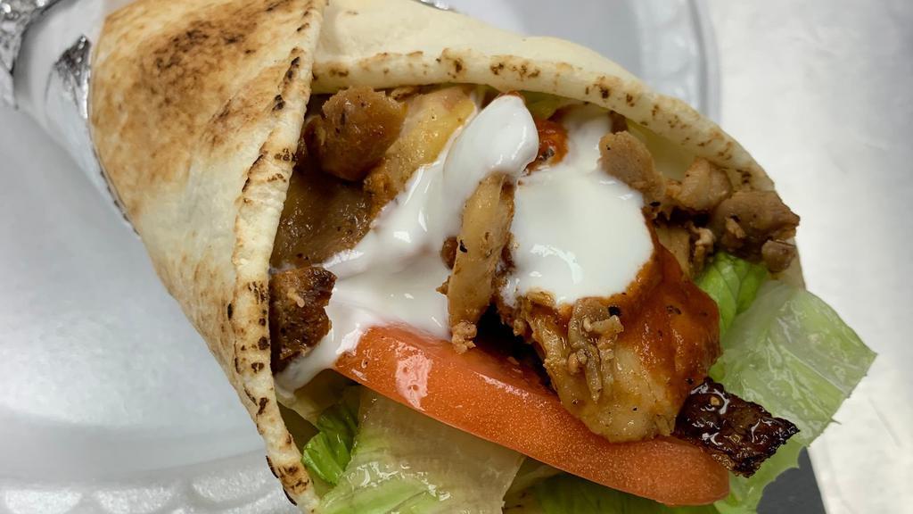 Chicken Shawarma Wrap · Top menu item. Includes lettuce, tomatoes, and onions.