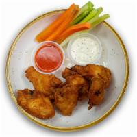 Wings · Lightly breaded chicken wings fried until golden brown served with choose of hot, bbq, or bu...