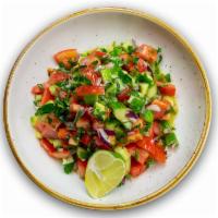 Shepherd Salad · Chopped cucumber, tomatoes, peppers, onion, and parsley. Topped a dressing of olive oil, lem...