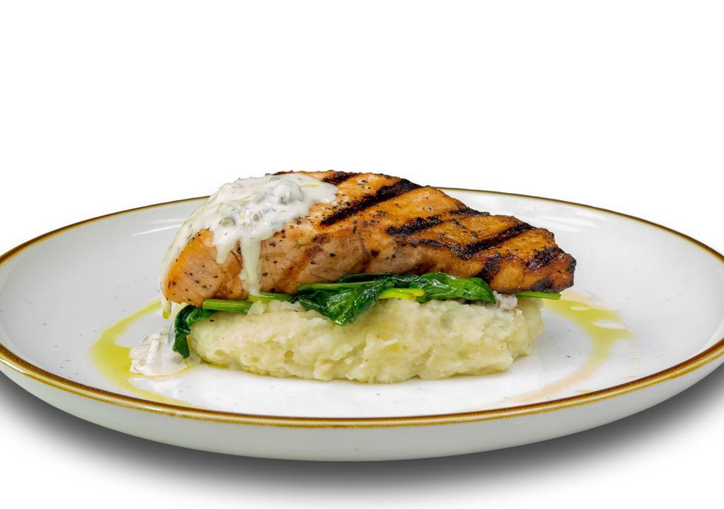 Salmon · Oil olive marinated salmon. Served with side of mashed potato, sautéed spinach, pickled onions and lemon cream sauce