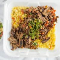 Beef & Lamb Shawarma Plate · Beef and lamb grilled on spinner then shaved.