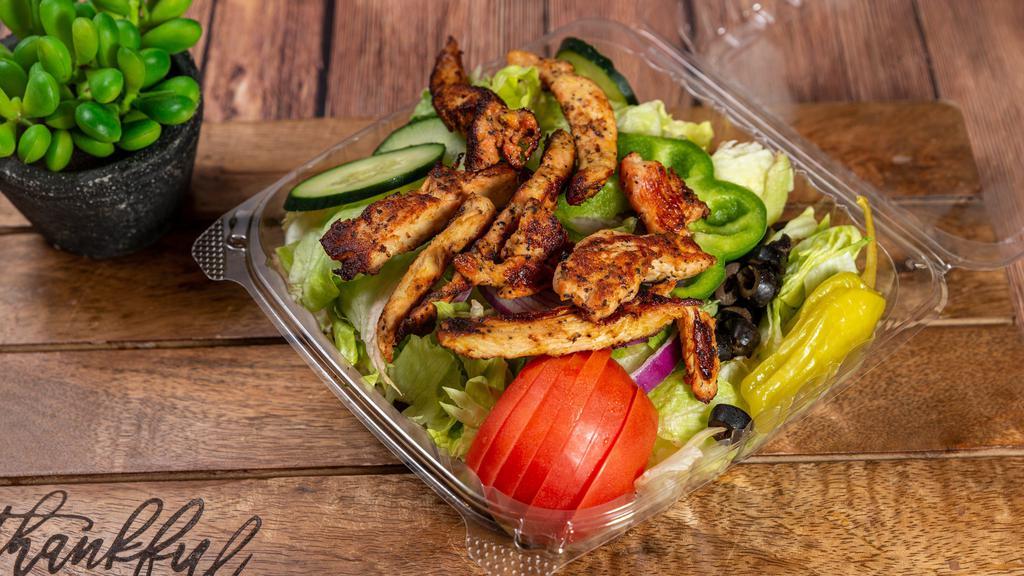 Grilled Chicken Salad · Lettuce, tomatoes, green peppers, onions, cucumbers, black olives and grilled chicken.