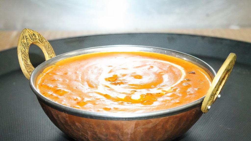 Dal Makhani  · Black lentils slowly simmered and flavored with tomatoes & ginger. (We also have Yellow Dal Tadka)