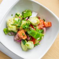 Kachumber Salad · Cubes of Cucumber, Tomatoes, Green Pepper, Red Onion seasoned with chat masala & herbs.