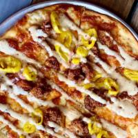 Bama Chicken Pizza · Garlic butter, mozzarella, crispy chicken, red onion, banana peppers, white barbecue sauce