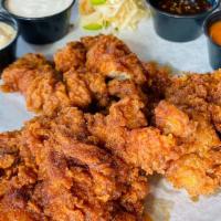 Classic Thighs · Two five ounces free range buttermilk brined chicken thighs. hand battered and fried. Topped...
