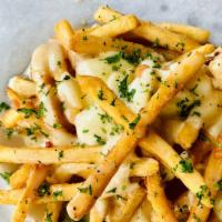 Poutine Fries · Crispy fries, cheese curds, savory gravy