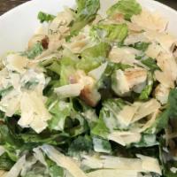 Caesar Salad · Fresh romaine lettuce, shaved parmesan, homemade caesar dressing, and garlic croutons.