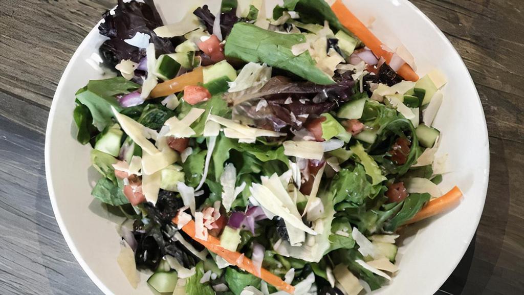 House Salad · Fresh mixed greens, tomatoes, shaved parmesan, onions, shredded carrots, black olives and cucumbers tossed in red wine vinaigrette.