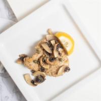 Kotopoulo Lemonato · Sauteéd breast of chicken with white wine, lemon, capers and mushrooms.