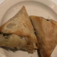 Spanakopita Appetizer · Layers of phyllo stuffed with fresh spinach and feta cheese (two pieces).
