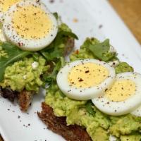 Avocado Toast (Gluten Free) · Avocado, arugula, feta cheese and hard boiled egg on gluten free toast.