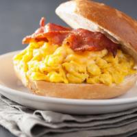 Egg, Cheese & Bacon Breakfast Sandwich · Buttery toasty sandwich filled with fluffy, scrambled eggs, melty American cheese and smoky,...