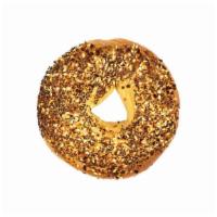 Everything Bagel · Freshly baked everything bagel, toasted with a generous smear of butter. Substitute cream ch...