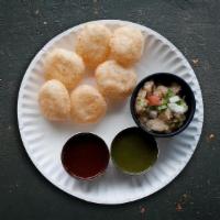 Balls Of Fury · Popular bite-size chaat consisting of a hollow, crispy-fried puffed ball that is filled with...