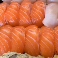 Sashimi Special 12 Pieces (Includes Rice) · 2 slices of tuna, salmon, white tuna octopus, surf clam and whitefish each. Including side s...