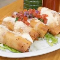 Tacos Dorados - (5)  (Golden Crispy Chicken Taco Rolls)
 · 