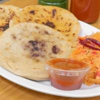 Pupusas · A hand-made tortilla with your choice of filling accompanied with curtido (a pickled cabbage...